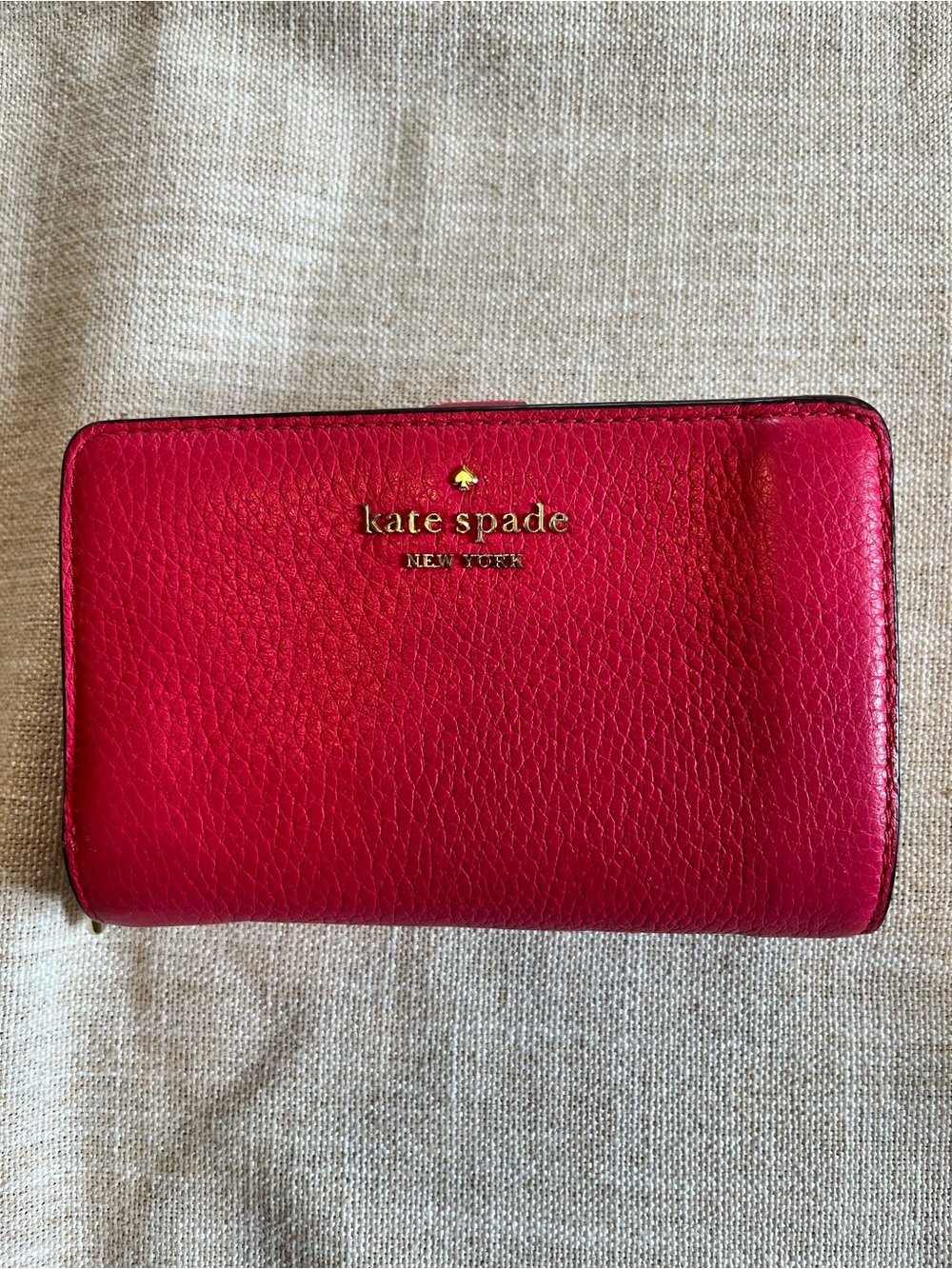 kate spade Red Pebbled Leather Zip Around Wallet with Gold Logo